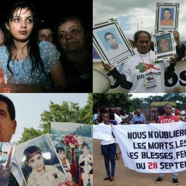 Georgians hold candles during a remembrance ceremony in Gori, west of Georgia’s capital, Tbilisi, a year after the August 2008 war between Georgia and Russia over the breakaway region of South Ossetia. 