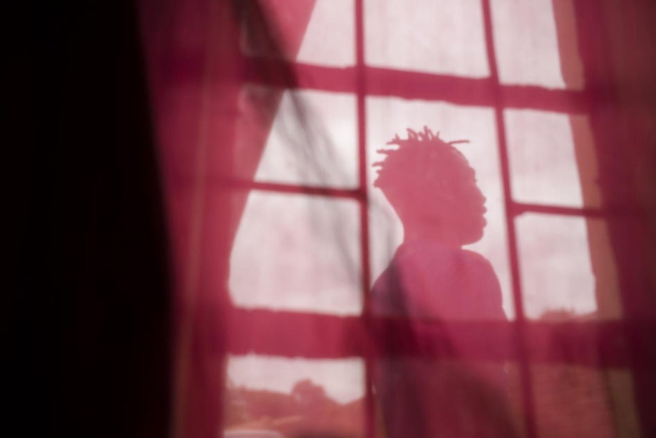 A young transgender woman at a friend’s house seeking temporary shelter in Lilongwe, Malawi. 