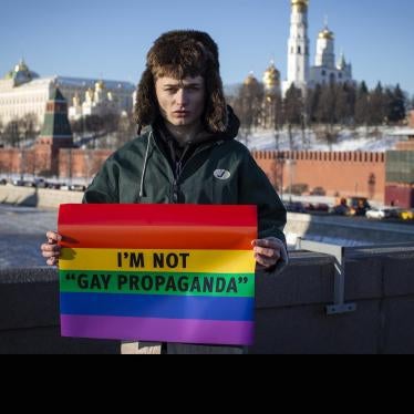 Russian blogger, Zhenya Svetski, stands with a sign reading “I am not ‘gay propaganda’” in Moscow, December 2018. 