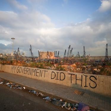 Graffiti on a wall that reads "My Government Did This"