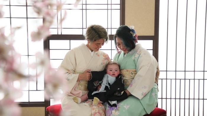 Human rights activists Mamiko Moda and Satoko Nagamura with their son, who they had in Japan using a donor.