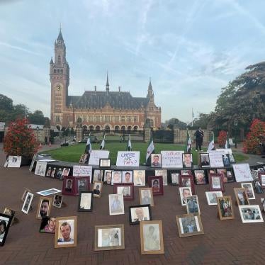 Photos of Syrians who have been detained or disappeared set up by their relatives, as part of a protest in front of the International Court of Justice in The Hague, Netherlands, on October 10, 2023.