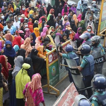 Police confront garment industry workers on the streets as they protest for a wage increase, Mirpur, Dhaka, Bangladesh, November 12, 2023.