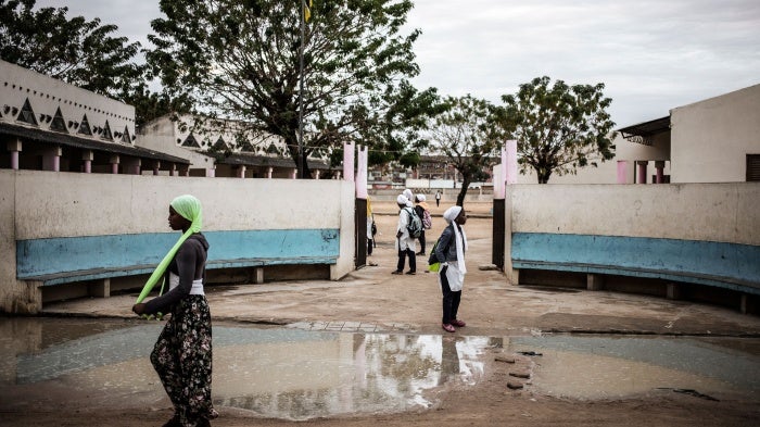 Girls in front of a school building