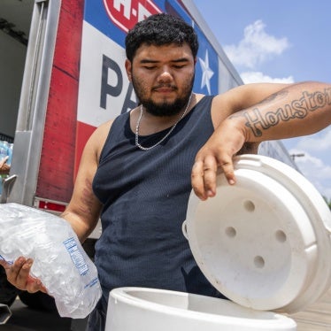 Memorial Assistance Ministries distribute water and ice during extreme heat in Houston, Texas, US, May 18, 2024. 