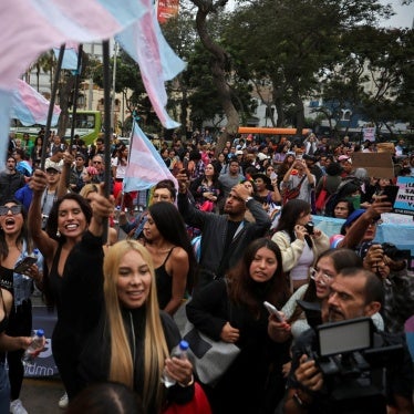 Peruvians protest in front of Peru's Ministry of Health against a presidential decree classifying transgender identities as mental health conditions in Lima, Peru, May 17, 2024.